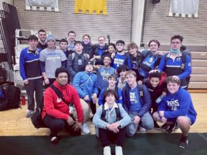 Varsity Wrestling celebration Coach Curby's 100th team win