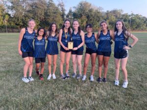 RB Girls Cross Country team holding plaque